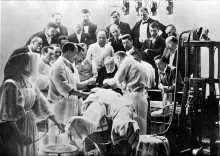 Photograph: Rudolf Virchow observing an operation, Berlin. Wellcome Collection.